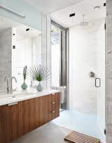 The bathroom features an indoor/outdoor shower. The Wetstyle sink is outfitted with a Blu Bathworks faucet.