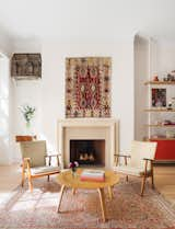 A collaboration between YUN Architecture and interior designer Penelope August, a renovated, 19th-century townhouse with landmark status used to be an egg and poultry distributor. Now virtually unrecognizable, the parlor floor is the home's open-plan living area. A formerly defunct fireplace was reactivated and clad with a custom-made, limestone mantle.