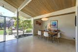 The dining area looks out over an exterior patio.

