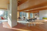 The living and dining areas are located in one large, open-plan space—which is typical of Breuer homes.