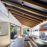 "The kitchen itself is generously proportioned, relative to the modest scale of the project, and is centered on the solid Spotted Gum countertop of the kitchen island," says Martin.