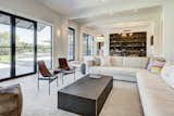 Living room with floor to ceiling windows. 