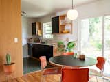 In the kitchen, Ben removed a peninsula counter unit with upper cabinets, which previously separated the kitchen and dining rooms and impeded flow. Ceiling soffits were removed as well to open up the space.