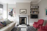 Astrain updated the fireplace with a Carrara marble Victorian fireplace surround from The Architectural Forum.