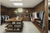 Black walnut surrounds the U-shaped master closet.