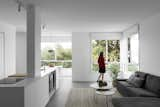 Removal of walls in a former laundry room, hallway, and a small corner room produced an open living space overlooking the Mediterranean.