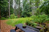 Surrounded by a thick forest, the property has a lovely private picnic area. The low-maintenance meadow grass does not require any mowing. 