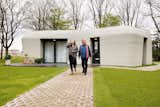 A Dutch Couple Are the First Tenants of This Boulder-Shaped 3D-Printed Home