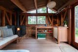 The floors are Doug fir, and the framing and rest of the wood inside is redwood. The french doors and lower window were made by Mike York at Ocean Sash &amp; Door Company, while the upper windows were made by Jeff and Molly.