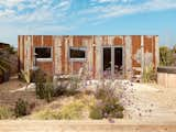 The corrugated clad exterior of the Carver's secluded studio and garden.