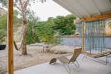 The desert rental includes an outdoor kitchen, shower, and bathtub, as well as a plunge pool and various outdoor seating areas.