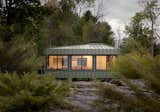 The Only Way to This Metal-Clad Cabin Is by Boat