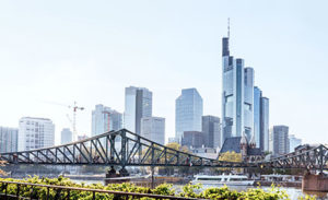 Image of a cityscape with a bridge.