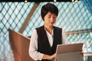 Woman using Surface Pro inside the Seattle Public Library.