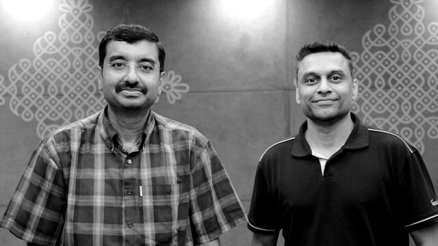 Black and white photo of Dr. Venkat Padmanabhan and Ajay Manchepalli