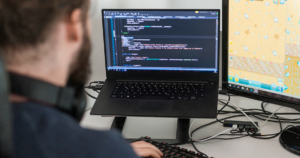 Image of a worker at his desk.