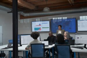 Chief Information Security Officer collaborating with practitioners in a security operations center.