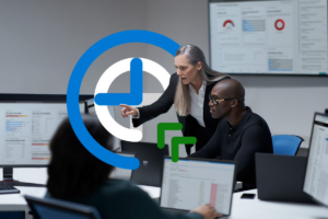 Chief information security officer collaborating with a practitioner in a security operations center.