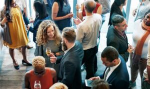 Attendees mingling at a conference.