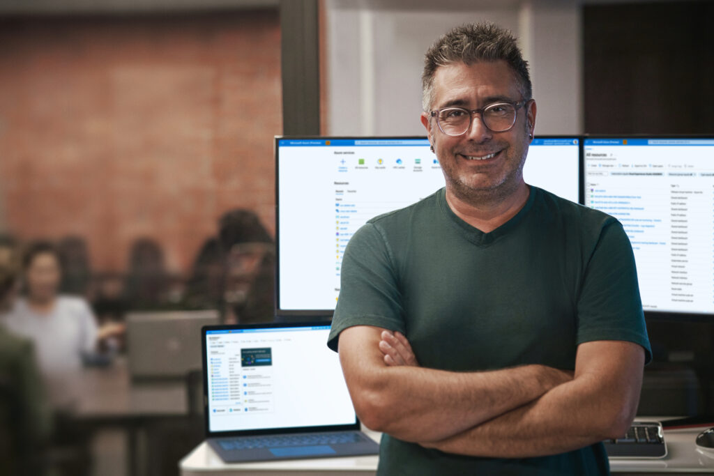 Man standing in front on computer