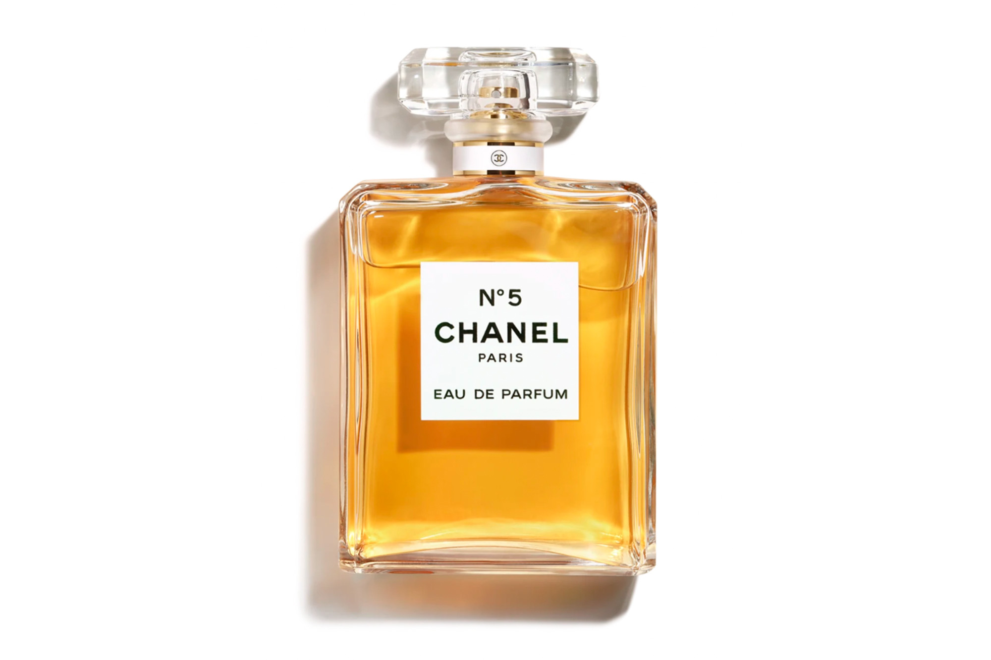 A Chanel No. 5 bottle filled with gold-colored parfum