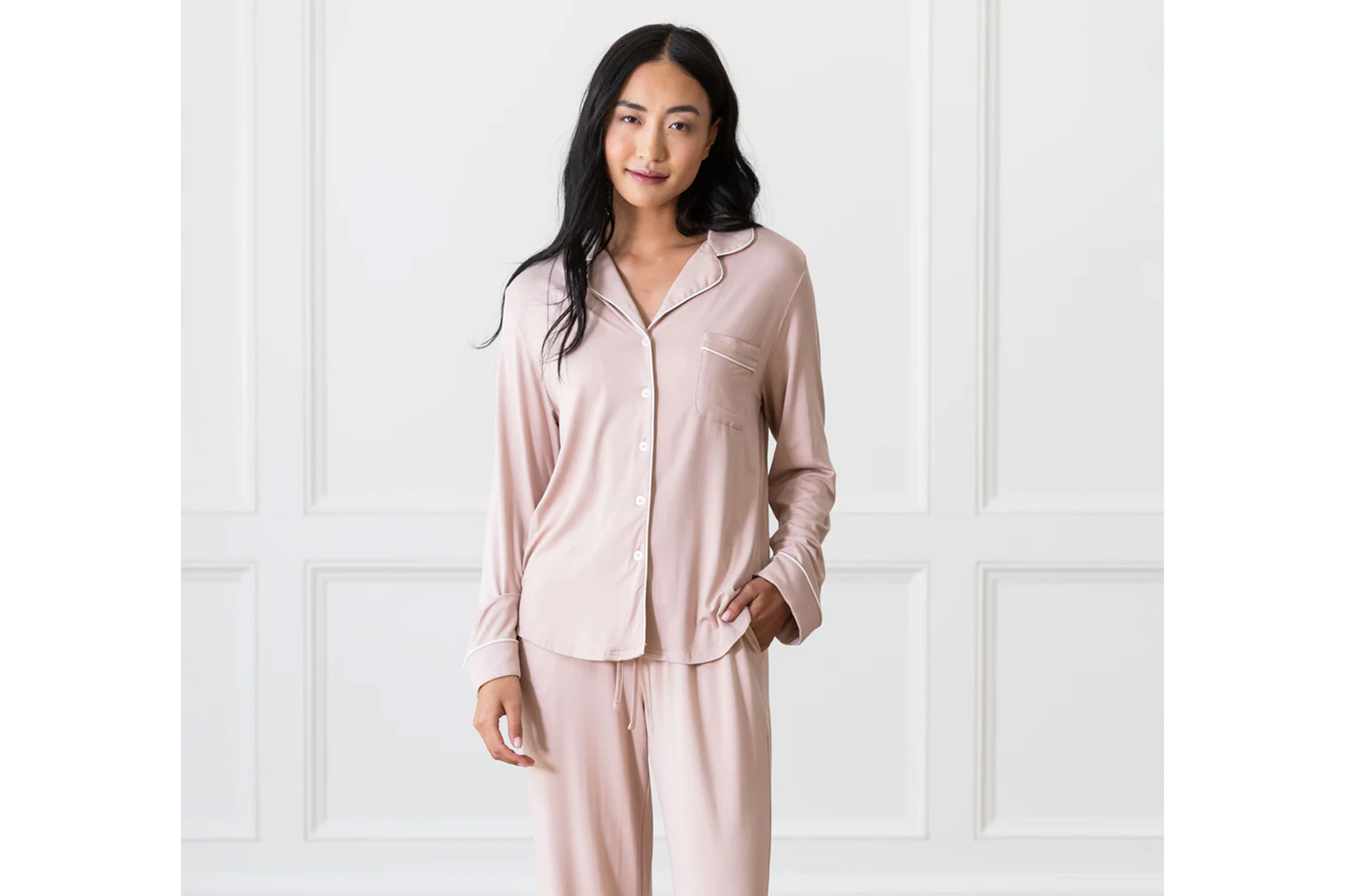 A model in pale pink pajamas