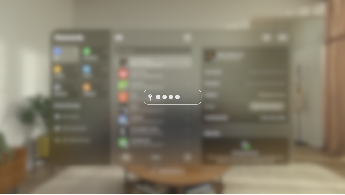 The view on Apple Vision Pro while a password is typed, as seen by someone watching on a mirrored display. The view is blurred, and an image indicates that the user is entering a password.