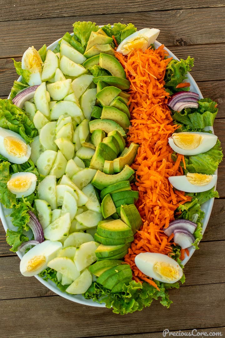 Vegetables for lettuce salad on a serving platter.