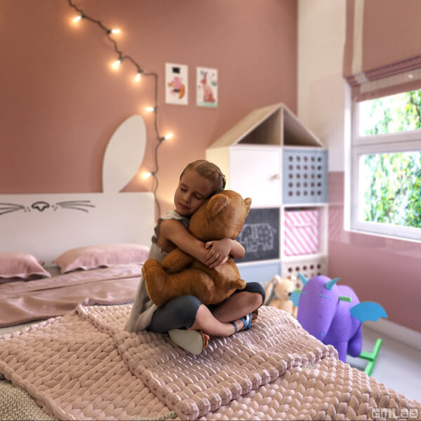 Girl cuddling with her teddy bear