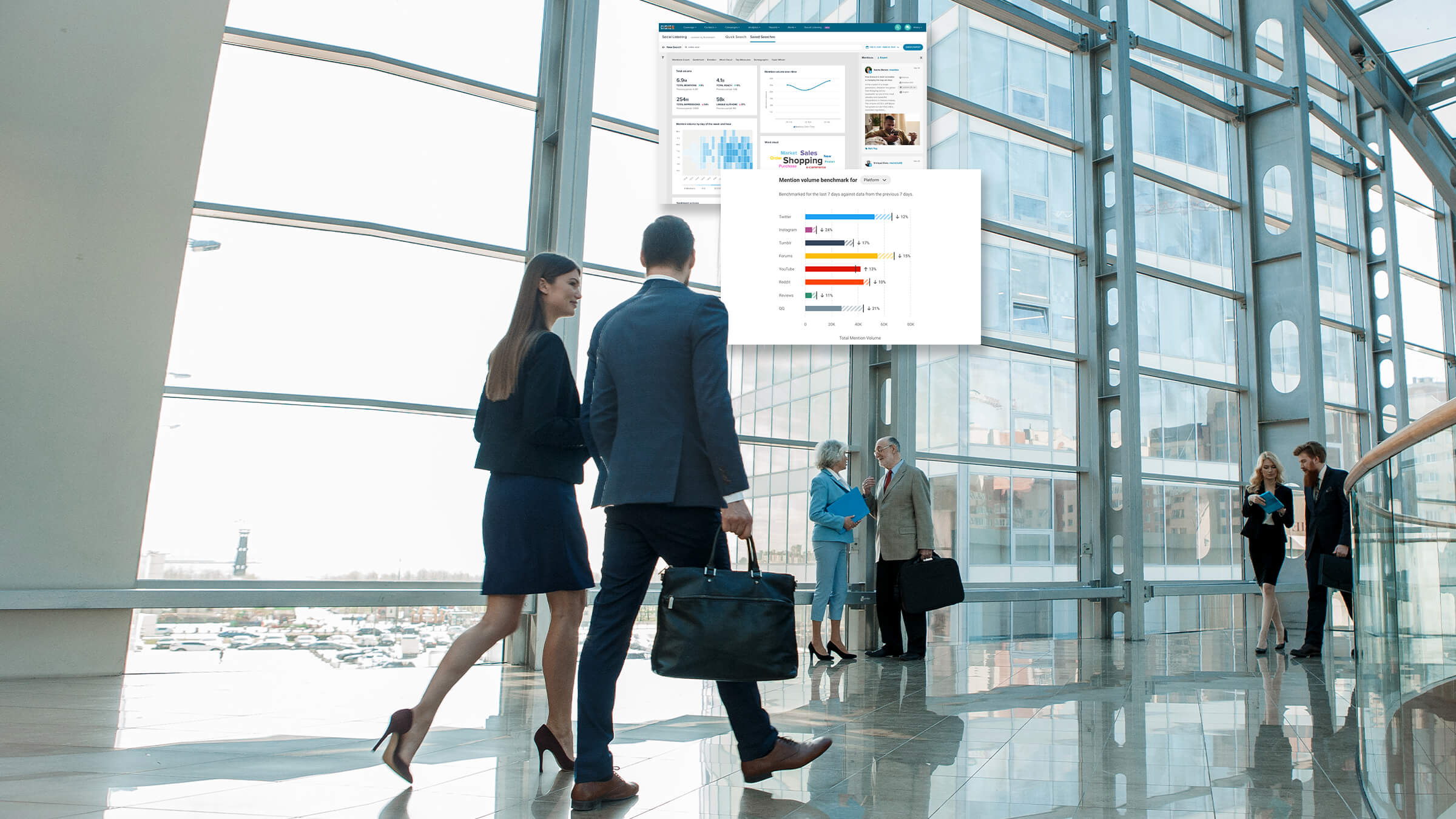 Two people walking through office