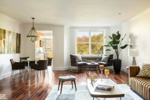 living room and dining area in Park Slope 1-bedroom overlooking Grand Army Plaza