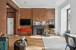 exposed brick and fireplace in Greenwich Village homes under $1M