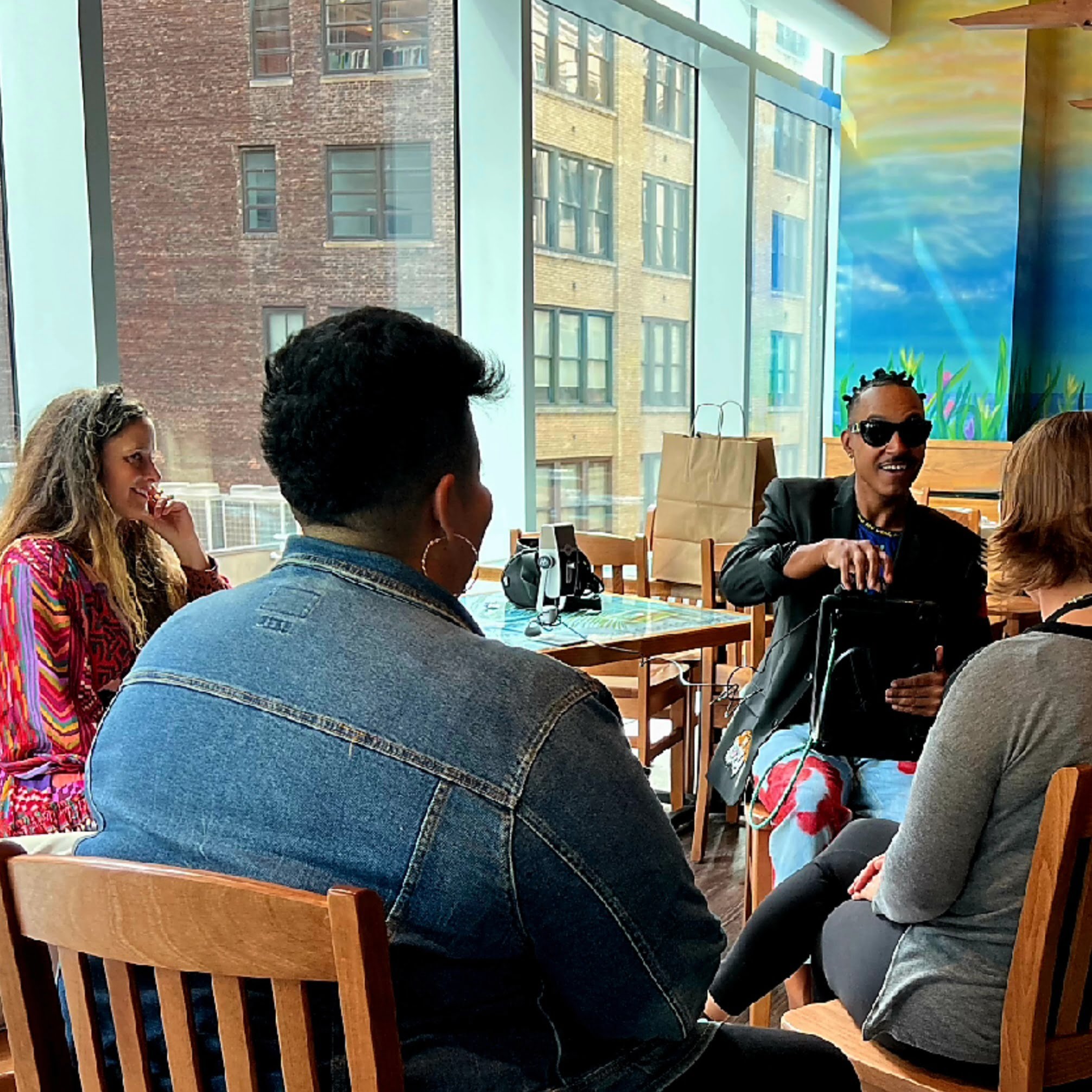 Vaughn lowery interviews nft vip speakers Nicole Buffett and Jesse Dylan in nyc via 360 MAGAZINE