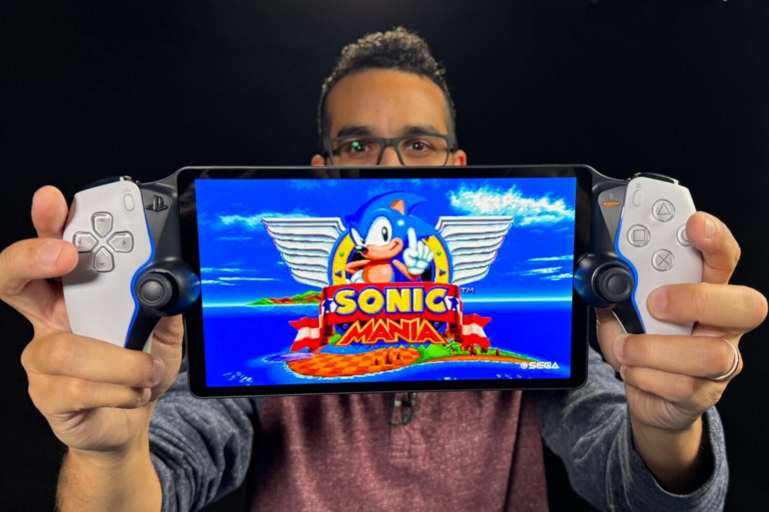 Sony Playstation Portal showing the game Sonic Mania with a band standing behind it