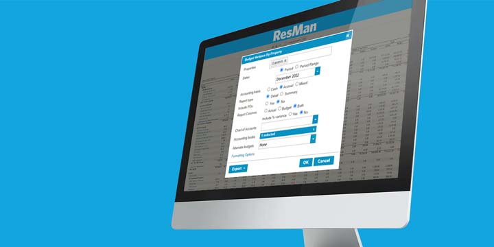 A computer monitor with the ResMan Reporting module on the screen.