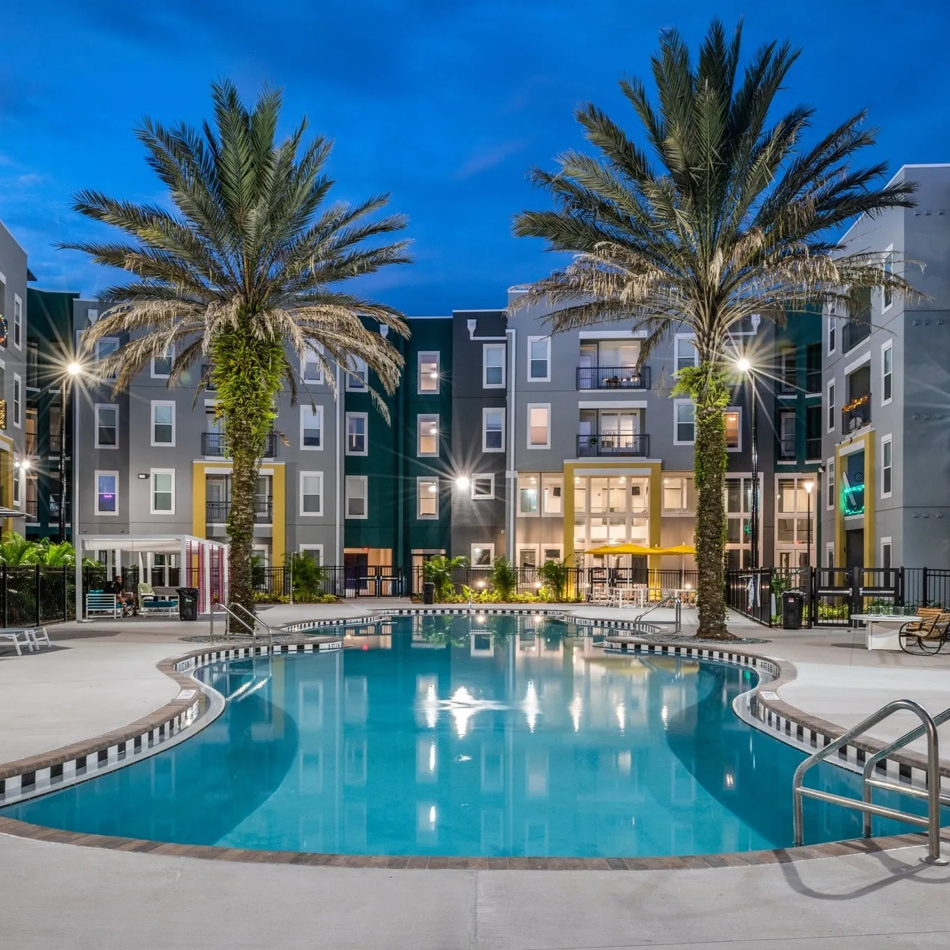 Exterior of an Asset Living managed property with a pool