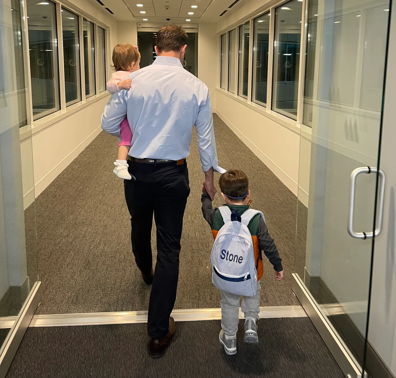 Asset living employee walking with their young children