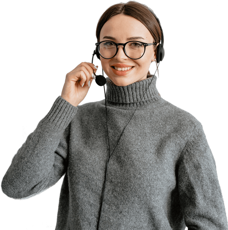 Anyone Home Contact Center agent with a gray sweater, glasses, and headset smiling.