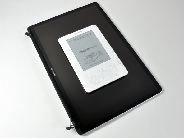 Kindle size compared to MacBook Pro 17