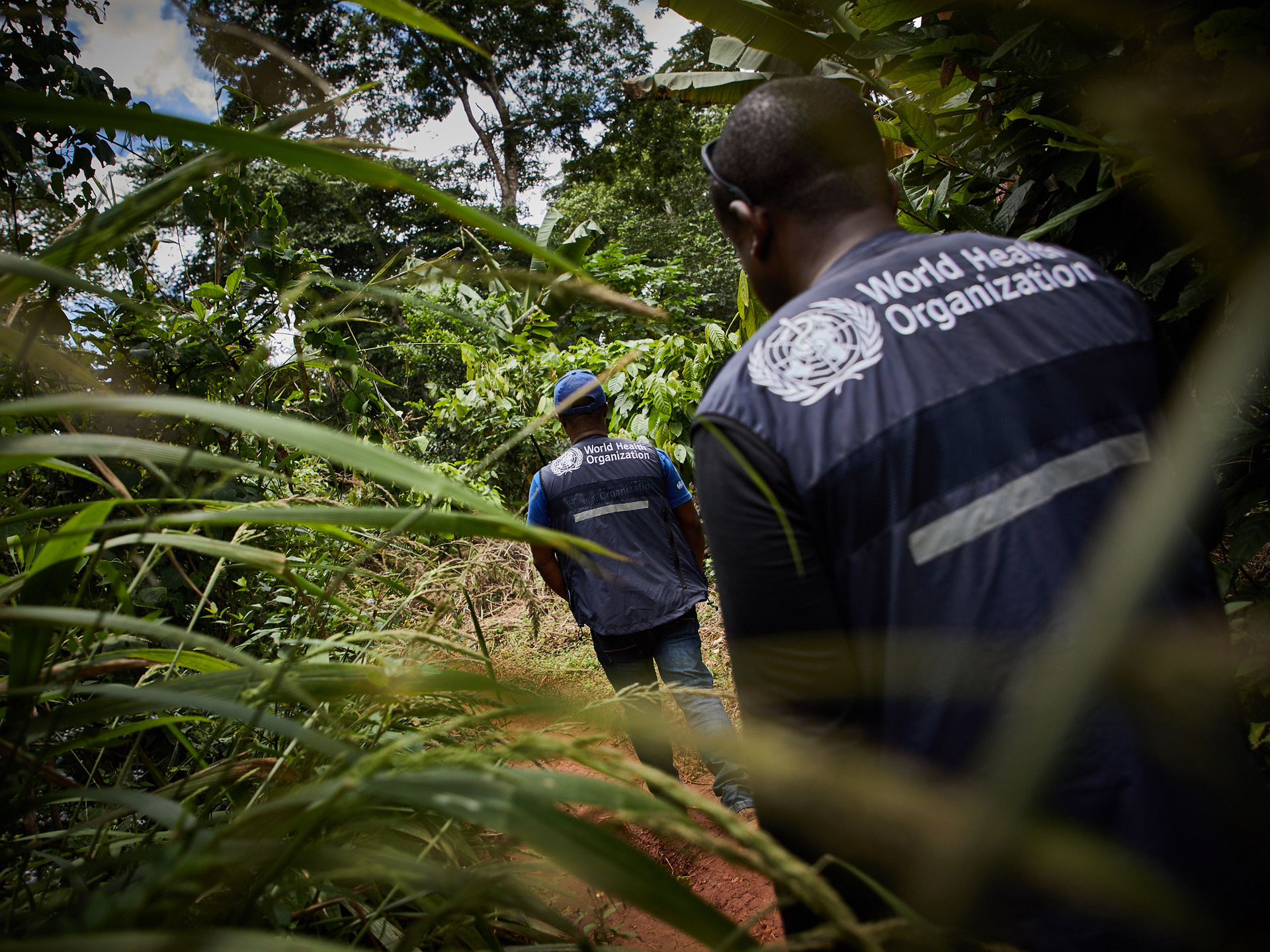 Staff of the World Health Organization move to Makangalo, Ituri Province.