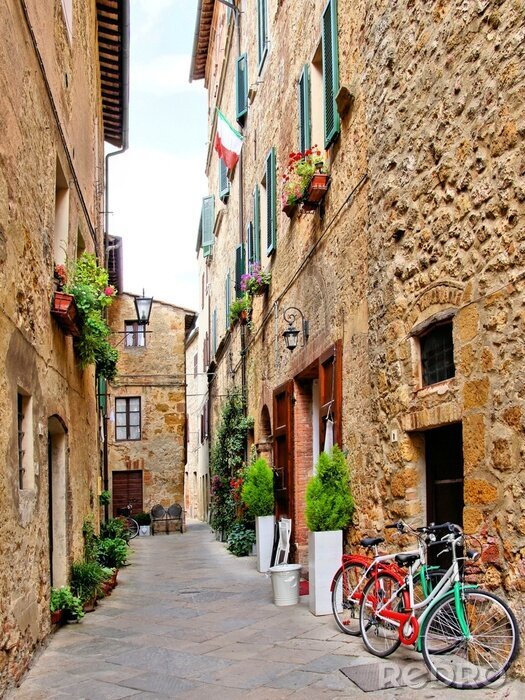 Fototapete Gasse mit Blumen und Fahrrädern