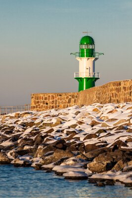 Fototapete Meer und Leuchtturm im Winter