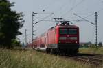 112 164-9 mit dem RE 7 in Neuss Allerheiligen am 23.06.2010