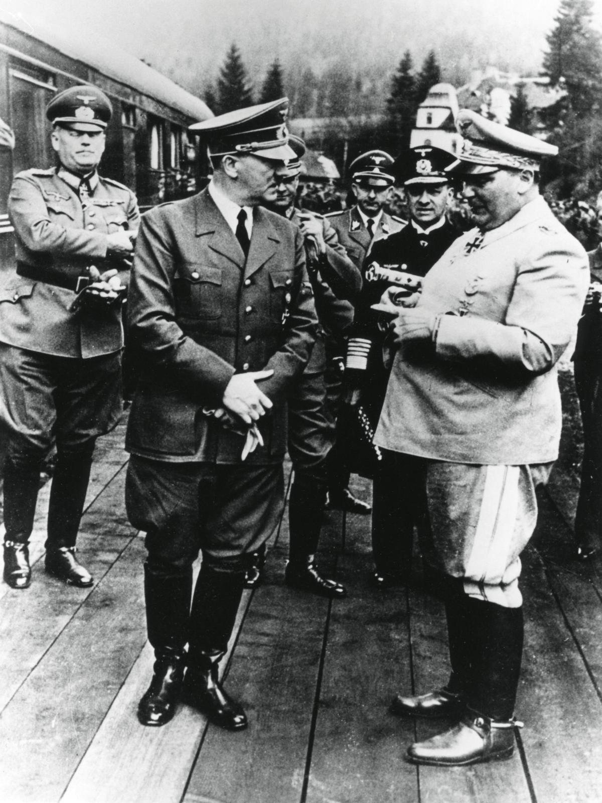 Adolf Hitler and Hermann Goering, Nazi leaders, Germany, 20 April 1941. Hitler, Goering and other senior Nazis at the fuhrer's headquarters on his 52nd birthday. Field Marshal Wilhelm Keitel is to the left of Hitler and Admiral Erich Raeder, commander of the German navy, immediately to the left of Goering. (Photo by Art Media/Print Collector/Getty Images)