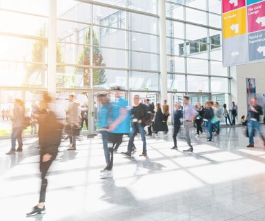 crowd of anonymous business people at a trade show