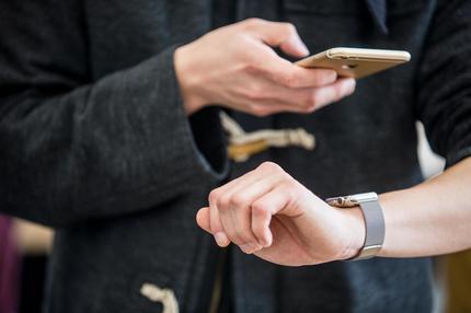 iPhone: Apple Watch Goes On Display At Apple Inc. Stores Ahead Of Sales Launch
HANGZHOU, CHINA - APRIL 10: (CHINA OUT) A customer takes photos of an Apple Watch smartwatch tried on his wrist with his iPhone at an Apple Store near West Lake on April 10, 2015 in Hangzhou, Zhejiang province of China. Apple's first new gadget under Chief Executive Officer Tim Cook is debuting in eight countries and Hong Kong for previews, with shipments scheduled to start April 24. Pre-orders will be available to customers on the Apple online store from April 10. (Photo by VCG/VCG via Getty Images)