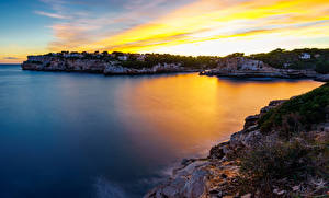 Bilder Mallorca Morgendämmerung und Sonnenuntergang Küste Bucht Felsen Mirador Es Pontas Natur