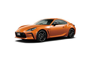 Image Toyota Orange Metallic White background GR 86 RZ 10th Anniversary Limited, 2022 Cars