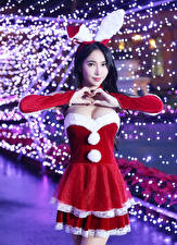 Image Asiatic Christmas Gestures Pose Hands Dress Brunette girl Heart Girls