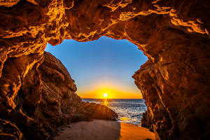 Bilder Vereinigte Staaten Küste Morgendämmerung und Sonnenuntergang Felsen Bogen architektur Sonne Kalifornien Malibu